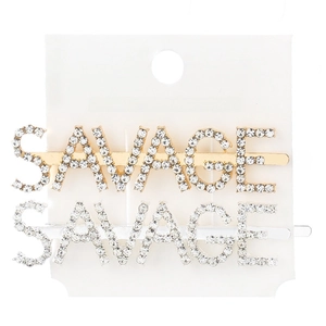 Detail of gold and silver metallic hair clips with sparkling rhinestone SAVAGE lettering