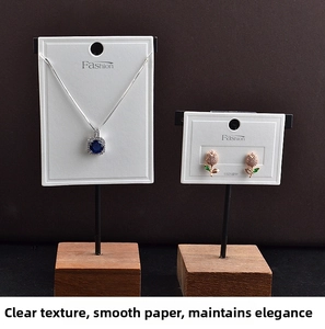Detail of S925 silver needle earring cards with luxury embossed texture for jewelry packaging