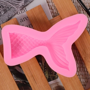 Pink silicone mermaid tail mold for fondant and cake decoration with realistic scales