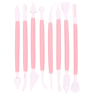 8-piece pink plastic clay sculpting tool set with double-headed tips on white background