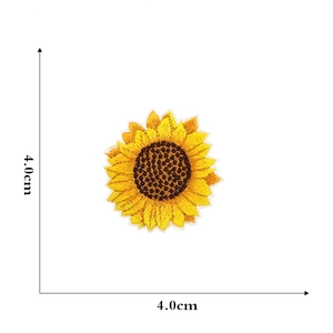 Detail showing 4cm sunflower embroidery patch with yellow petals and brown center