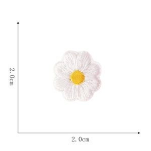Detailed close-up of a small white daisy embroidered patch with 2cm size dimensions