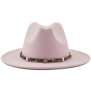 Detail of pink fedora hat with leopard print band, golden stars, and metallic studs
