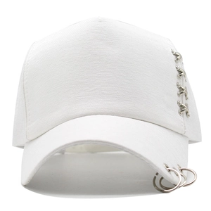 White cotton baseball cap with silver metal rings on brim and side chain details