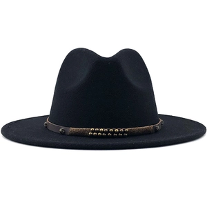 Detail of wool fedora hat featuring a brown leather band with metallic rivet accents