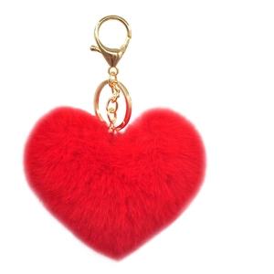 Red heart plush pom-pom keychain with gold-tone lobster clasp on white background