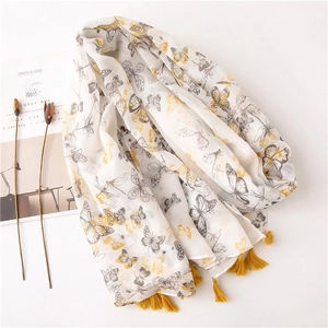 Beige cotton-linen scarf with yellow butterfly prints and tassel fringe detail