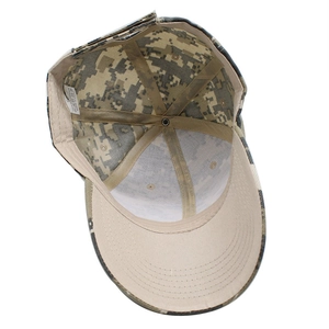Close-up of the camouflage baseball cap interior with 100% polyester washing label