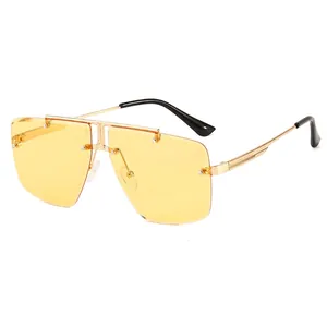 Stylish oversized rimless square sunglasses with yellow lenses and gold metal frame