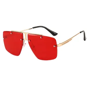 Fashionable rimless oversized square sunglasses with red lenses and gold metal frames