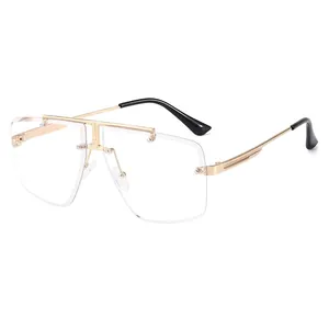 Retro rimless square sunglasses with large transparent lenses and gold metal temples