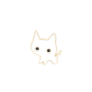 Detailed view of a cute cartoon white cat enamel pin with golden metallic outlines