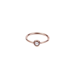 Minimalist rose gold stainless steel ring featuring a single round zircon solitaire stone