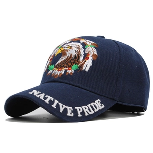 Detail of navy cotton baseball cap with eagle embroidery and Native Pride text on the brim