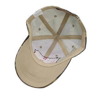 Internal view of camouflage skull baseball cap showing 100% acrylic material and stitching