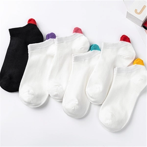 Set of 6 women low cut ankle socks in black and white with colorful heart heel tabs