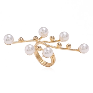 Detailed view of a multi-layer gold branch ring featuring six elegant white pearls