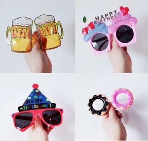 Funny birthday party sunglasses in beer, cupcake, hat and donut shapes set of 4