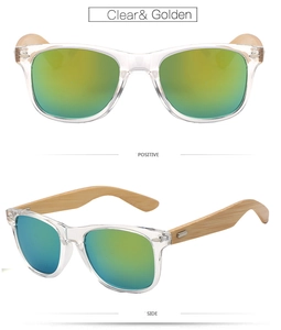Detail view of colorful polarized sunglasses with clear frames and natural bamboo temples