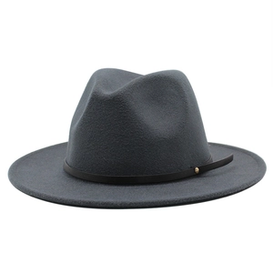 Detail of dark grey wool fedora hat with black leather strap and gold metal rivets