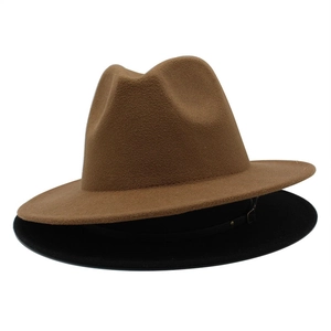 Detail showing the wool-like felt texture of brown and black fedora jazz hats