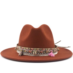 Caramel wide brim wool fedora hat with bohemian woven band and fringe accents