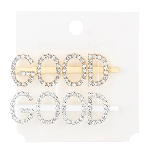 Detailed view of silver and gold GOOD letter hairpins with crystal rhinestones