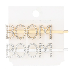 Detailed macro view of the rhinestone BOOM letter hair clips in gold and silver finish