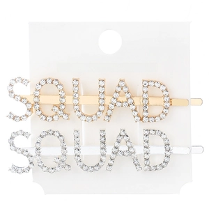 Detailed close-up of gold and silver SQUAD rhinestone letter hairpins on display card
