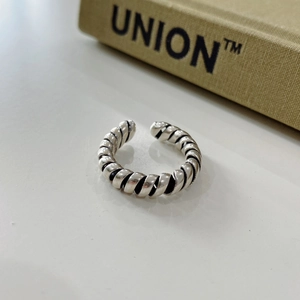 Detailed view of the vintage twisted texture and silver oxidized finish on the open ring