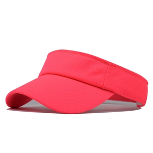 Close-up of rose red cotton sun visor with breathable mesh fabric and detailed stitching
