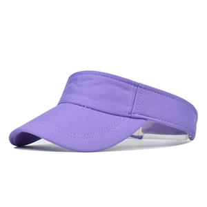 Detailed side view of a purple cotton sun visor hat with adjustable strap for women.