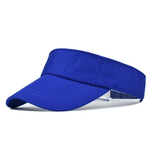 Detail of royal blue cotton visor showing breathable mesh texture and reinforced double stitching