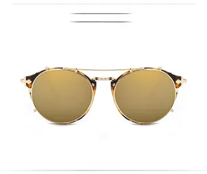 Front view of KD813 circular sunglasses with gold mirrored lenses and tortoiseshell frame
