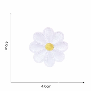 Detail showing a 4cm white daisy embroidery patch with dimensions on white background