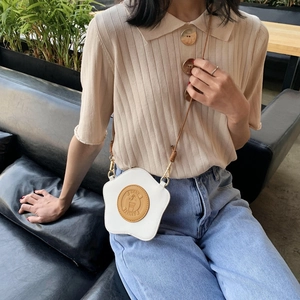 Creative breakfast bread and egg shape white crossbody bag for women in cafe setting