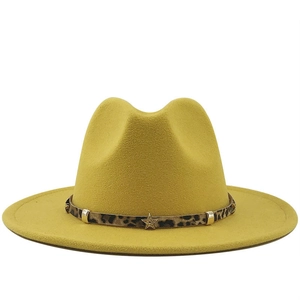 Yellow wide brim wool fedora hat featuring leopard print band with star metal accents