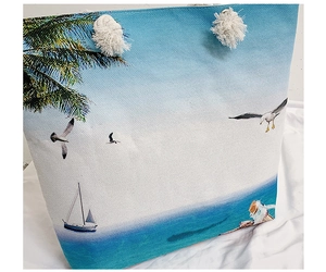 Detail of beach tote with nautical digital print and white cotton rope handles