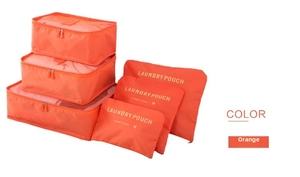 Detailed view of 6-piece orange nylon travel organizers including laundry pouches and bags