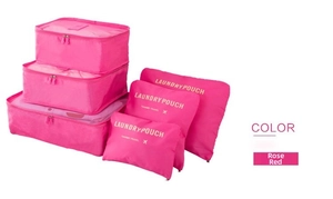 Detail view of rose red 6-piece travel organizer set with mesh bags and laundry pouches