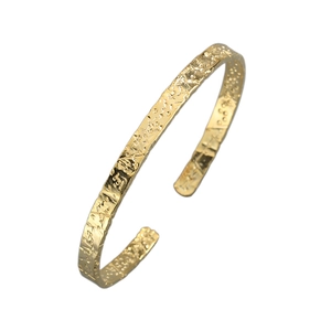 Elegant gold open cuff bracelet with handcrafted hammered texture for modern women
