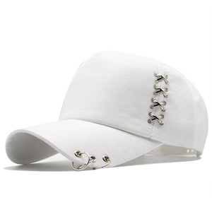 White hip hop baseball cap with three silver metal rings on brim and side cross straps