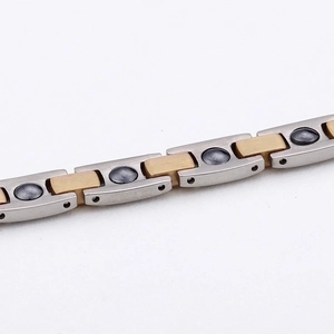 Two-tone titanium steel magnetic bracelet for men with silver and gold links and therapy stones
