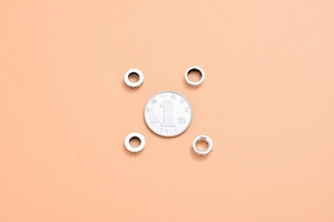 Macro shot of S925 sterling silver spacer beads with vintage engraved textures for DIY jewelry