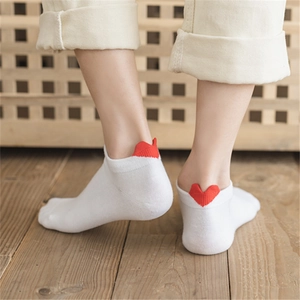 White cotton low-cut socks for women with a red heart embroidery on the heel