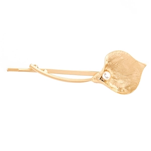 Elegant gold calla lily hair clip with hammered metal texture and white pearl accent