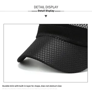Close-up of breathable black mesh fabric and reinforced brim on the summer sun hat