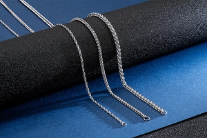 Close-up of various silver stainless steel keel and basket chains in different thicknesses