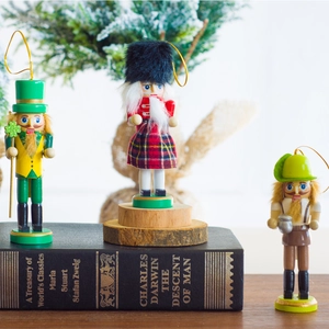 Three 13cm wooden nutcracker soldiers for Christmas home decor with hanging loops