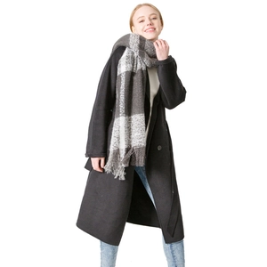 Women's autumn winter thick grey and white plaid tassel scarf with a black coat